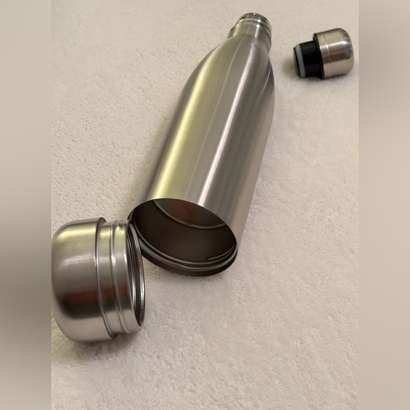 Stash spot located in a stainless steels steel water bottle. - Picture 1 of 5
